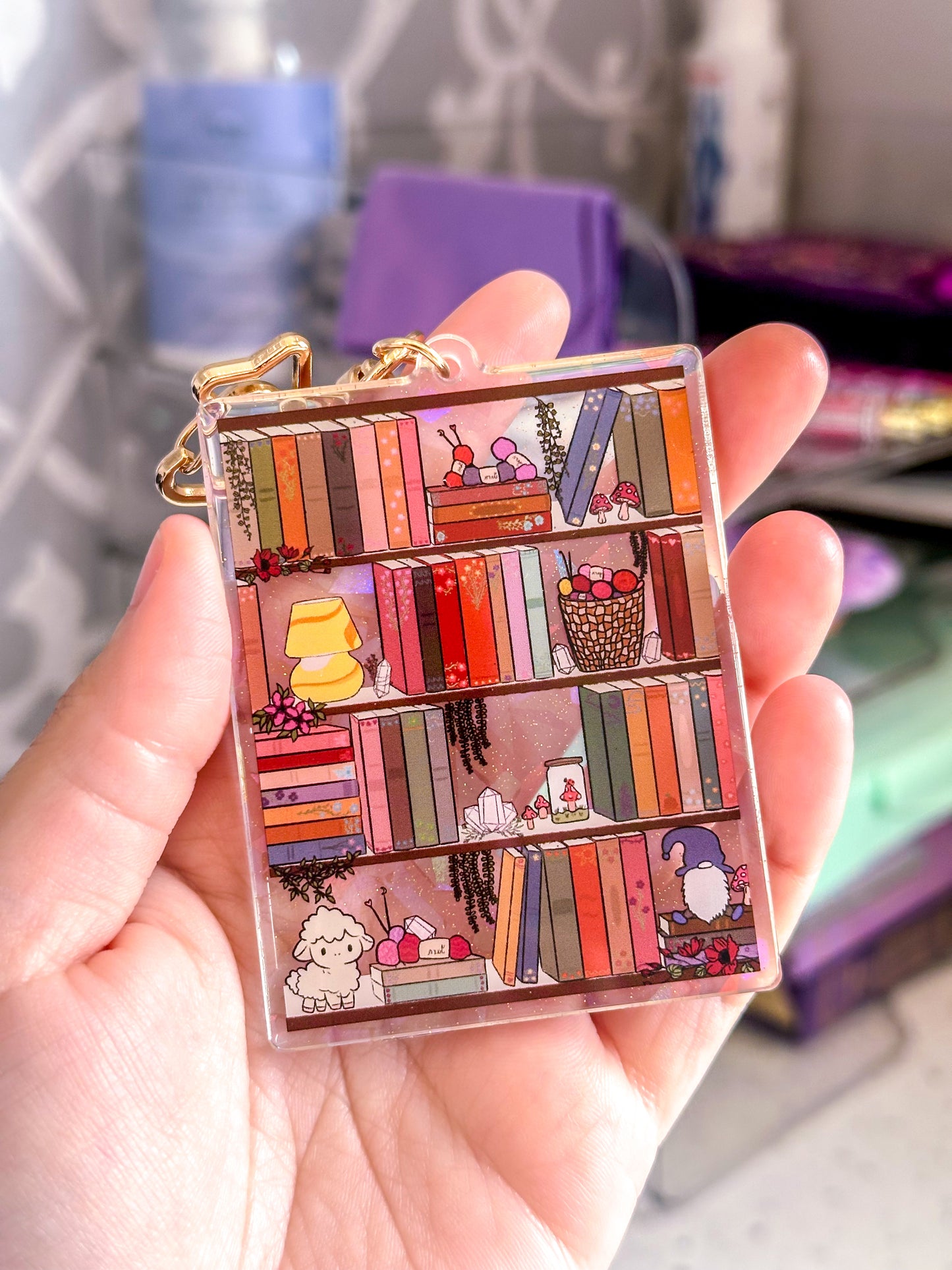 The Cozy Cottage Bookshelf Acrylic Holographic Keychain