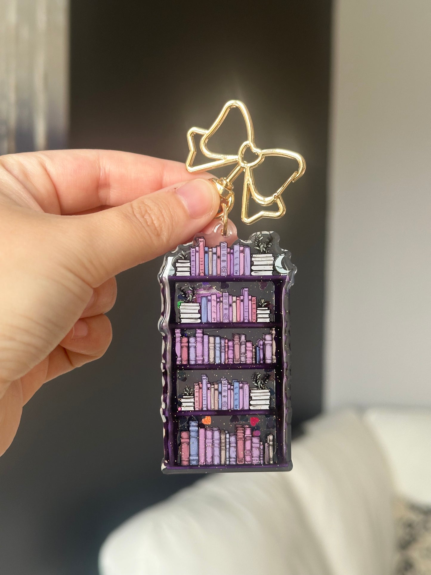 The Violet Bookshelf Glitter Shaker Keychain