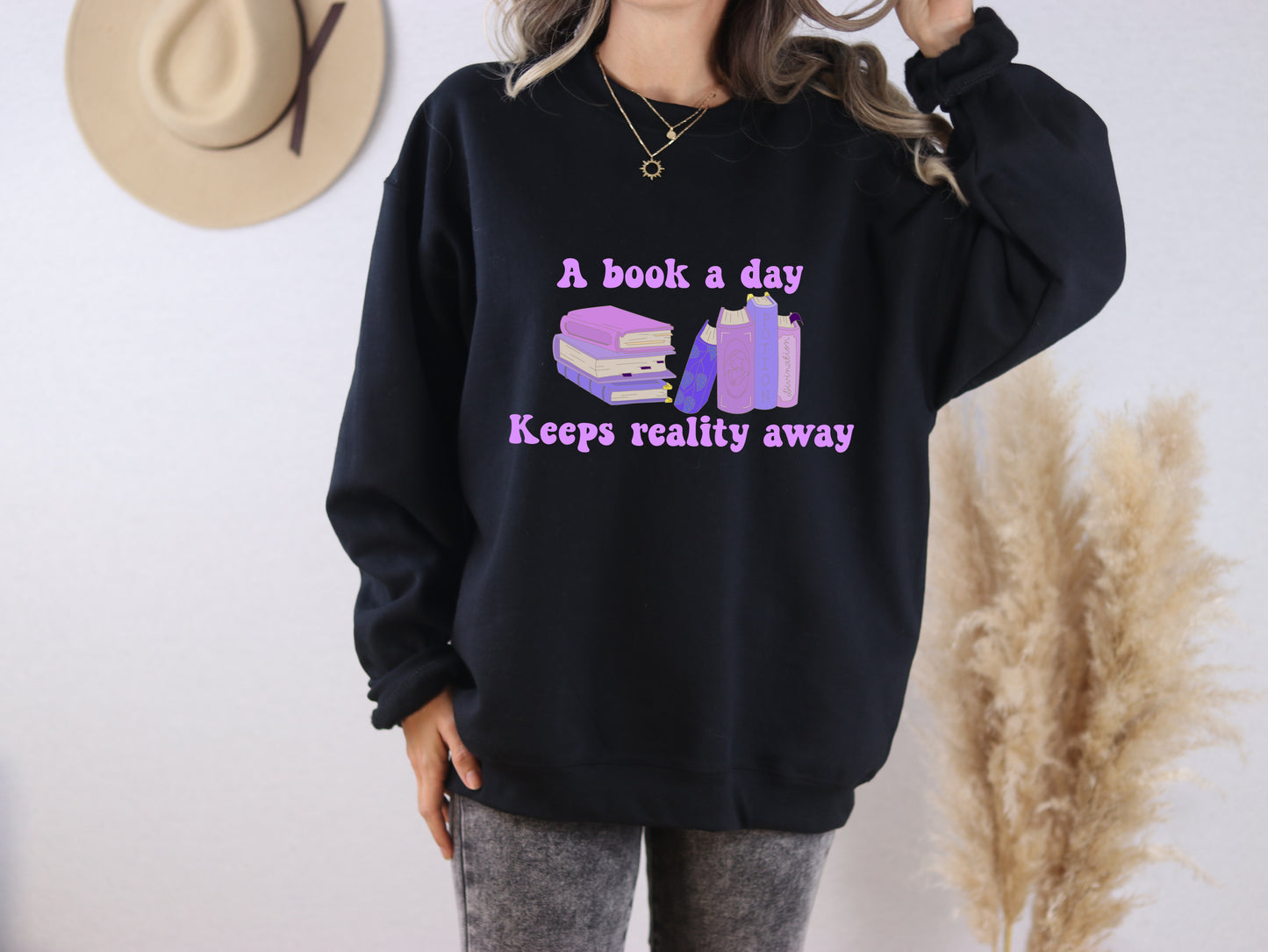 A Book A Day Keeps Reality Away Crewneck Sweatshirt