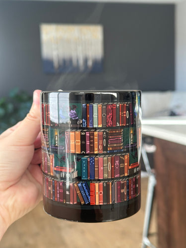 The Illuminated Bookshelf Black Mug, 11oz