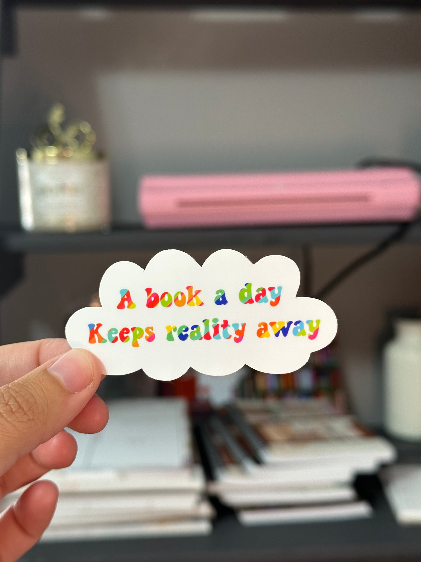 A book a day keeps reality away sticker