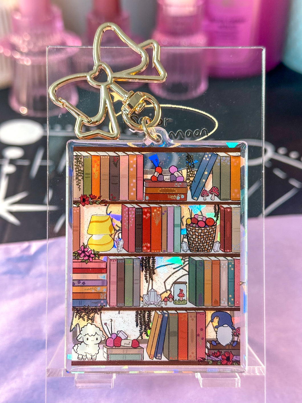 The Cozy Cottage Bookshelf Acrylic Holographic Keychain