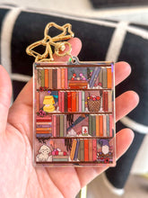 Load image into Gallery viewer, The Cozy Cottage Bookshelf Acrylic Holographic Keychain
